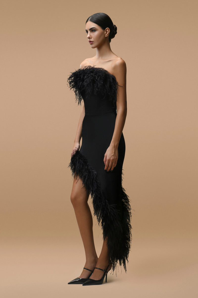 Black Valerie mini dress by MATTERS, featuring a sleek design and fitted silhouette, shown on a model.