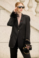 Black Kelly Taffeta feather suit co-ords by 21Six, featuring a feather-embellished jacket and matching pants.