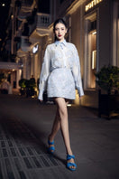 Feliccia blue shiny silk floral co-ords shirt and skirt set by 21Six, featuring a glossy fabric with floral pattern and stylish design.