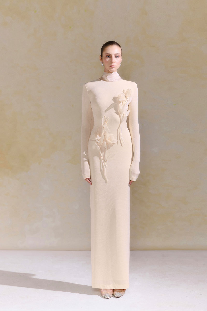 Arti Apparel Doha midi dress featuring a stylish, flowing design with a fitted waist and elegant neckline.