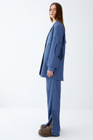 Blue ColoReve sweat pants with an elastic waistband and relaxed fit, shown lying flat.