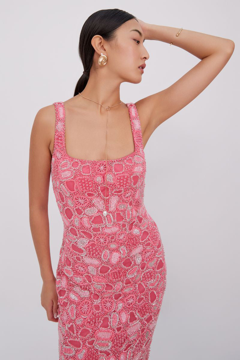 Raishma Sybil Gown displayed with elegant fabric and detailed design, showcasing a stylish and sophisticated evening gown.