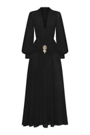 Black midi dress by CEM with gold jeweled embellishments, featuring a fitted silhouette and elegant design.