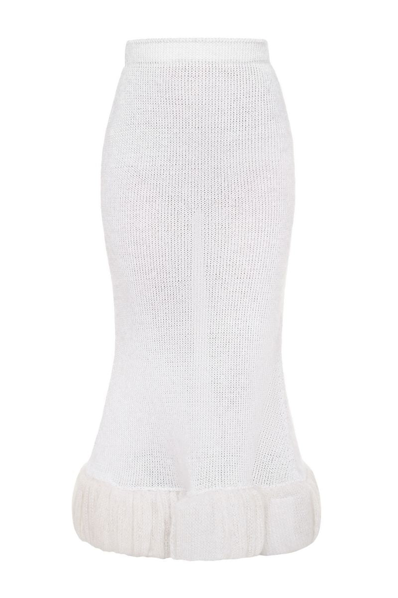 White knitted maxi skirt by Lalo, featuring a flowing design and textured knit fabric, perfect for casual or elegant outfits.