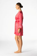 NK IMODE Melody Self-Indulge short robe in cherry, soft fabric with lace trim, displayed on a hanger.