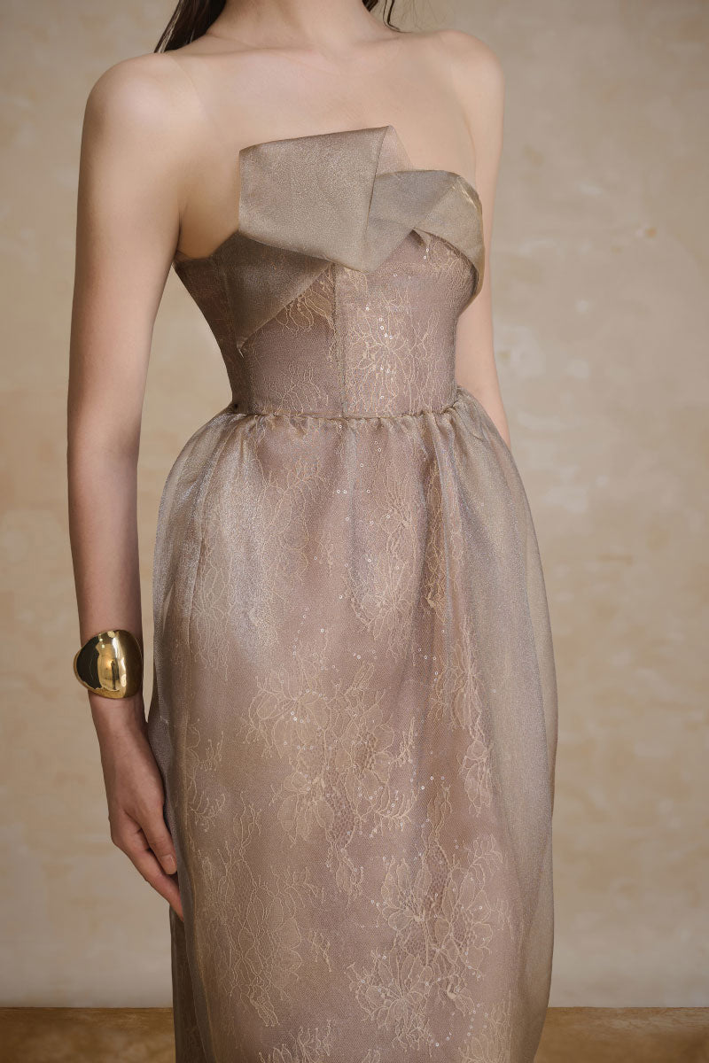 Elegant FLUX gown by Arti Apparel featuring flowing fabric and a stylish design, perfect for formal occasions.