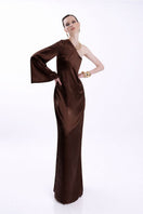 LEDIEL Cartagena brown maxi dress displayed on a model, featuring a flowy silhouette and elegant design.