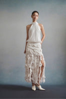 White Plan Flora halter midi dress featuring floral print, sleeveless design, and flowing fabric perfect for summer wear.