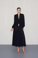 CEM gold jeweled embellishment black midi dress with elegant design and intricate detailing, perfect for formal occasions.
