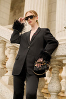 Black Kelly Taffeta Feather Suit co-ord set by 21Six, featuring a feather-embellished jacket and matching pants.