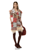 Lalo Avril knitwear vest in red and gold with a textured pattern, sleeveless design, and stylish, vibrant color combination.