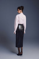Black leather sculpted midi skirt by Keira Tong, featuring a fitted waist and sleek, tailored design.