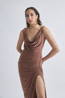 Deme By Gabriella CULT MIA X DEME maxi dress in flowing fabric with floral pattern and sleeveless design, full-length view.