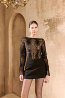 Arti Apparel Ontario mini skirt in black, stylish high-waisted design with a fitted silhouette, perfect for casual or dressy outfits.