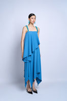 Aidan & Ice Flora Blue Top, stylish women's blouse with floral pattern, short sleeves, and relaxed fit, displayed on a hanger.
