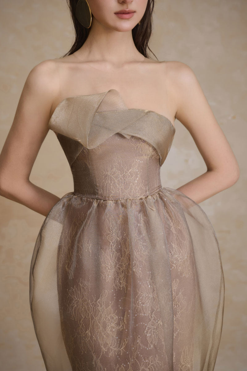 Elegant flux gown by Arti Apparel featuring flowing fabric and intricate detailing, perfect for formal occasions.