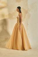 Off-shoulder chiffon and mesh gown by L'SCARLETT with flowing fabric and elegant design, perfect for formal occasions.