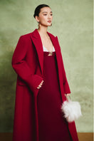 White Plan Scarlet tailored coat displayed on a model, featuring a classic design with a tailored fit and elegant style.