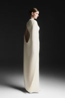 Maison Des Copains NYXELLE cape sleeve floor-length gown in vanilla cream, featuring elegant flowing fabric and sophisticated style.