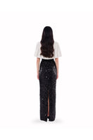 HACCHIC COUTURE Luna Cape Gown in black featuring elegant flowing fabric and sophisticated design for formal occasions.