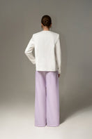Liya white sweetheart blazer with fitted design, long sleeves, and tailored collar, perfect for stylish professional or casual wear.