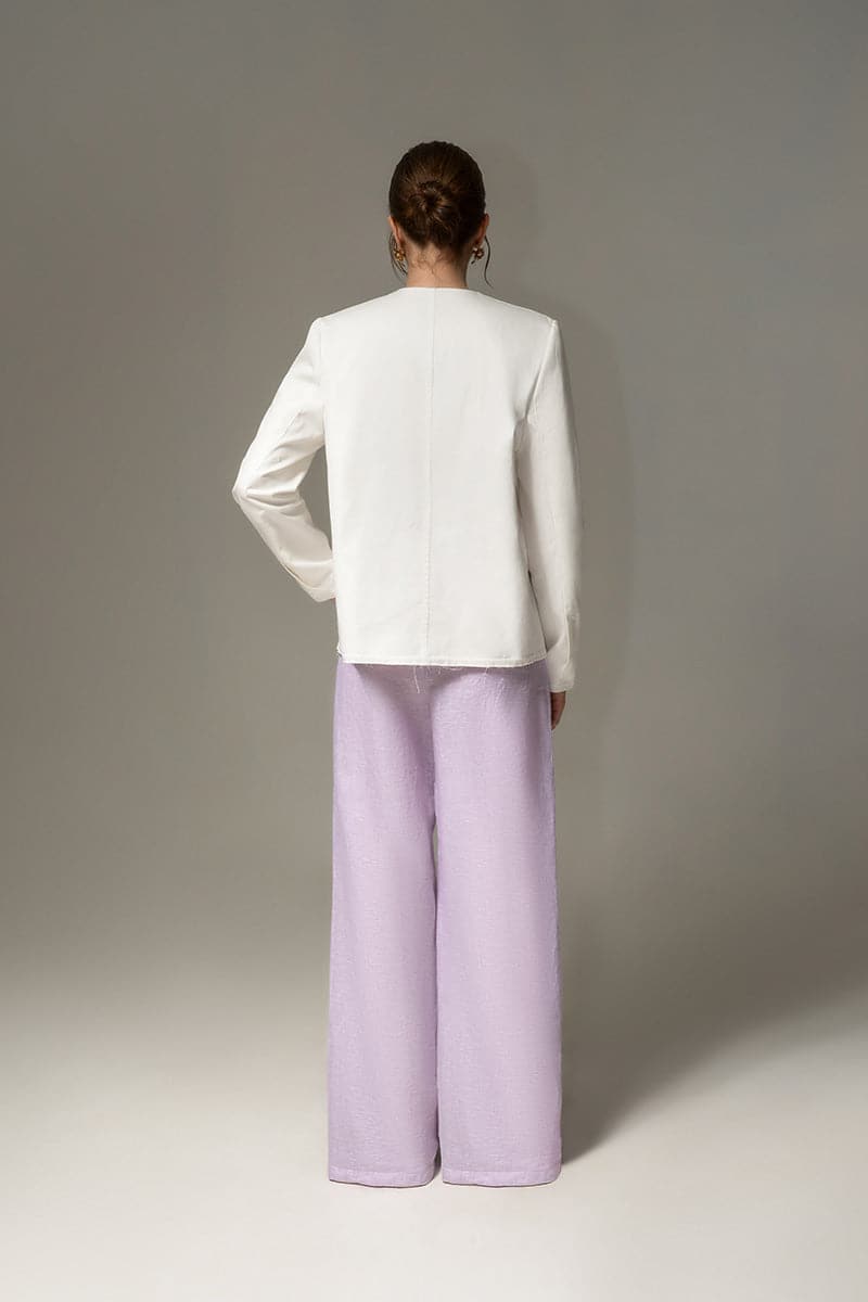 Liya white sweetheart blazer with fitted design, long sleeves, and tailored collar, perfect for stylish professional or casual wear.