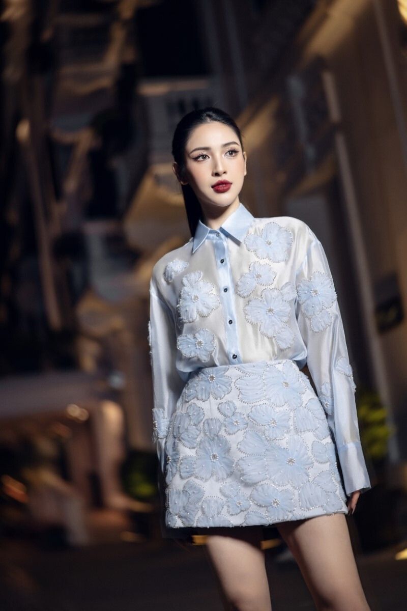 FELICIA blue shiny silk floral co-ord set with matching shirt and skirt from 21Six, featuring a glossy fabric and vibrant floral pattern.
