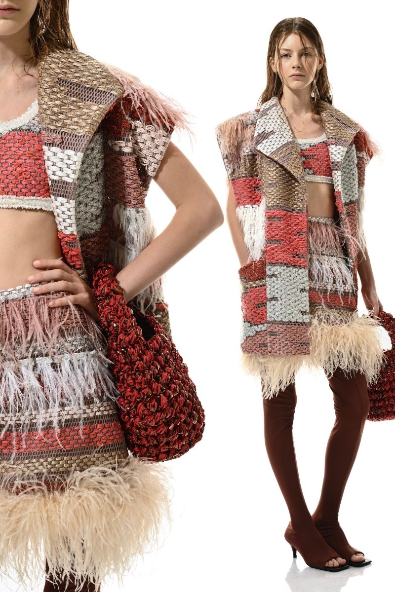 Lalo Avril vest in red and gold knitwear, featuring a stylish design with gold accents and a cozy fit.