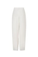 White tapered leg trousers by Valenciani, showing a close-up of the stylish, fitted design and smooth fabric.
