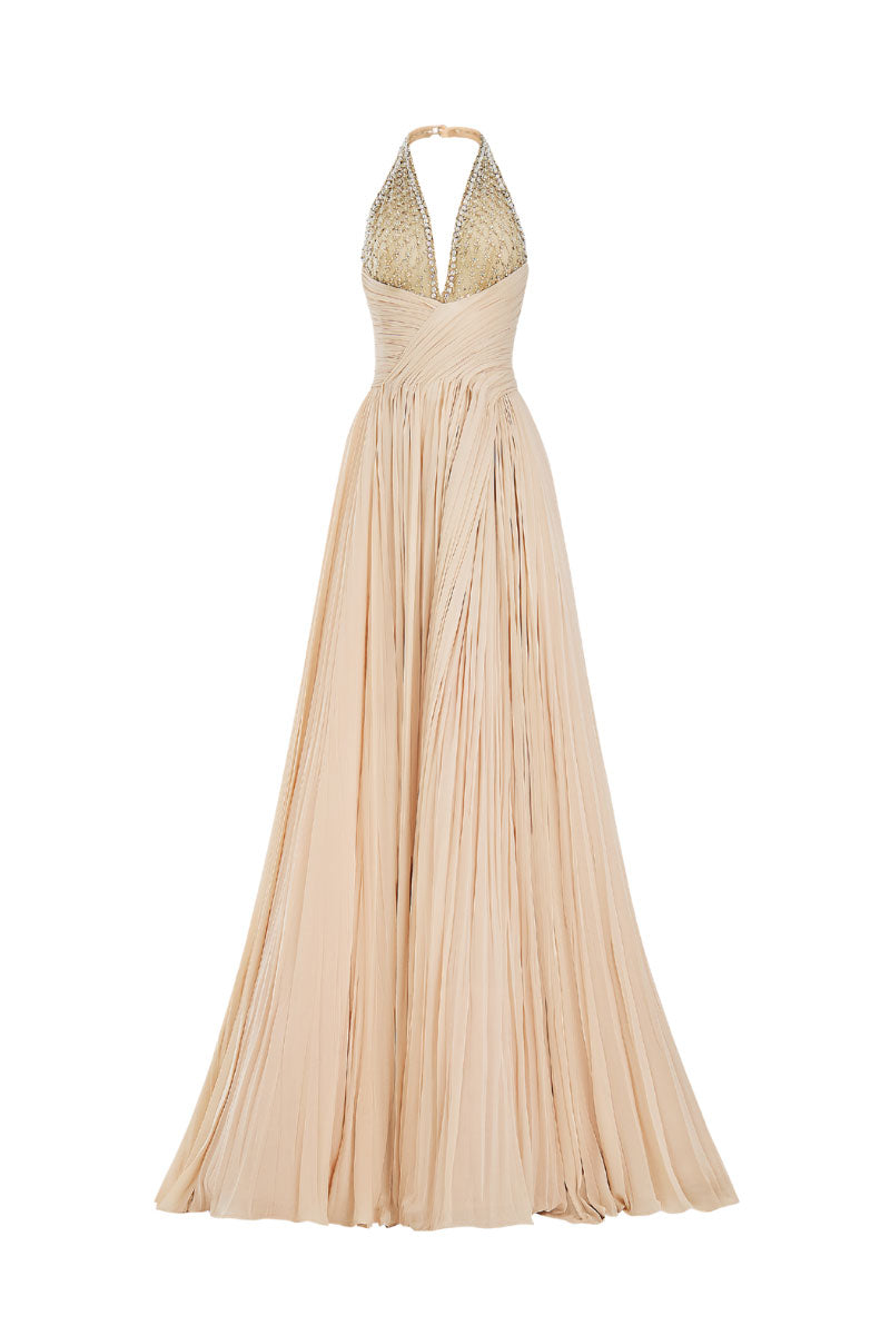 Beige crystal chiffon gown by CEM featuring flowing fabric and elegant design, perfect for formal occasions.