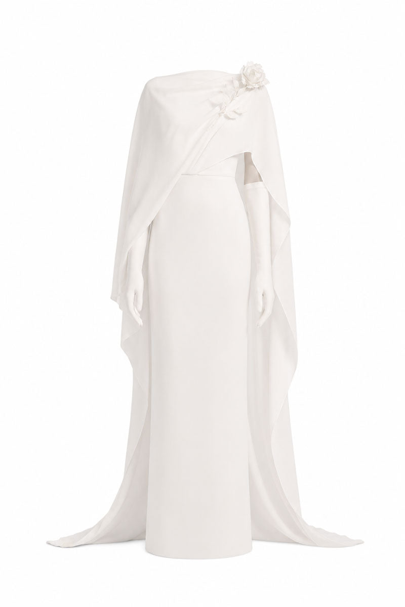 Elegant White Plan Chariot gown with flowing fabric and intricate detailing, perfect for formal occasions.