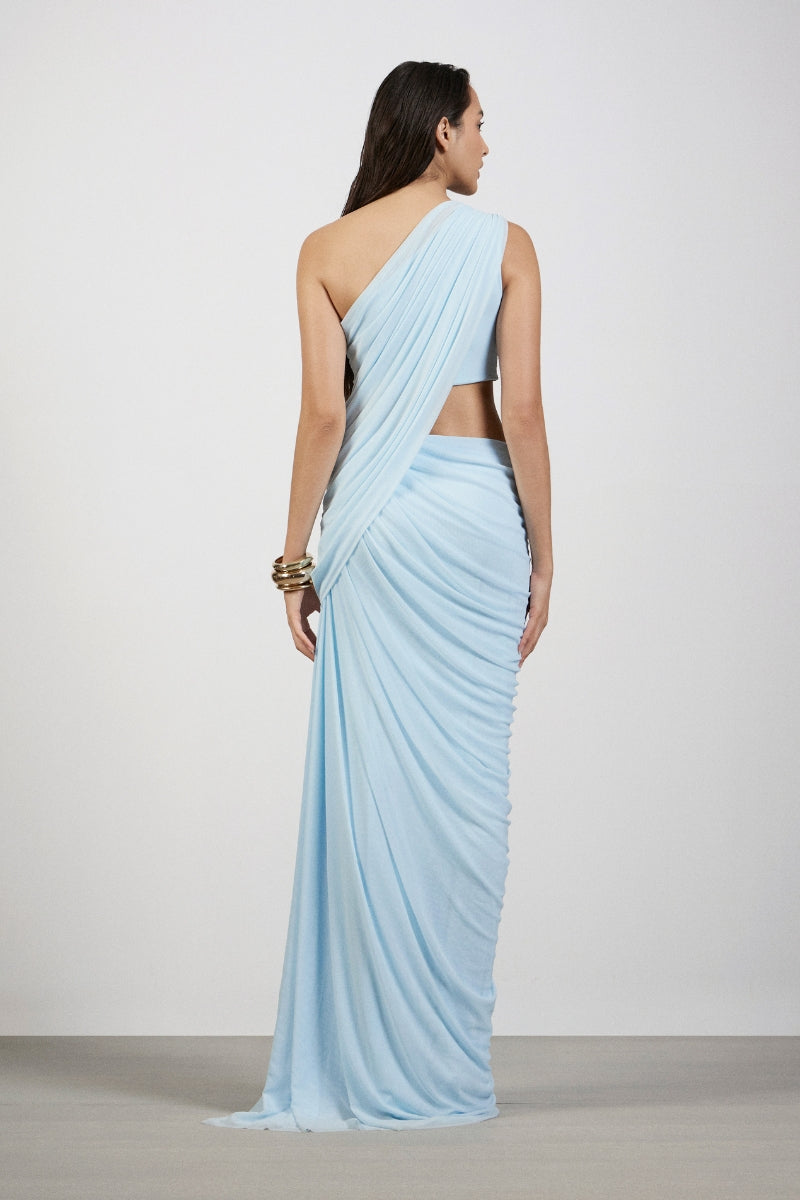 Deme By Gabriella Aurora Blue maxi dress with flowing fabric and sleeveless design, perfect for summer occasions.