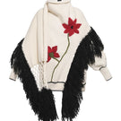 Blikvanger floral hand-knit cardigan with colorful knitted flowers and a cozy, textured fabric, perfect for layering.