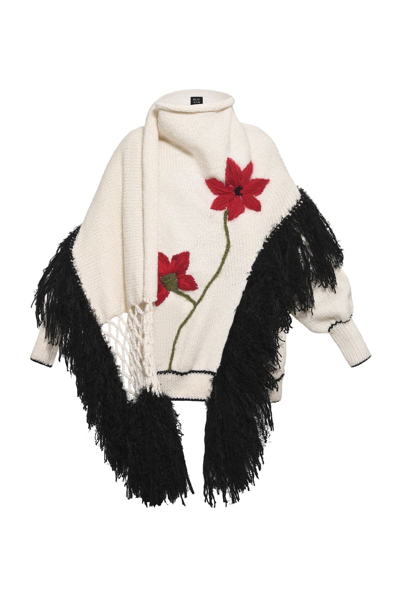 Blikvanger floral hand-knit cardigan with colorful knitted flowers and a cozy, textured fabric, perfect for layering.