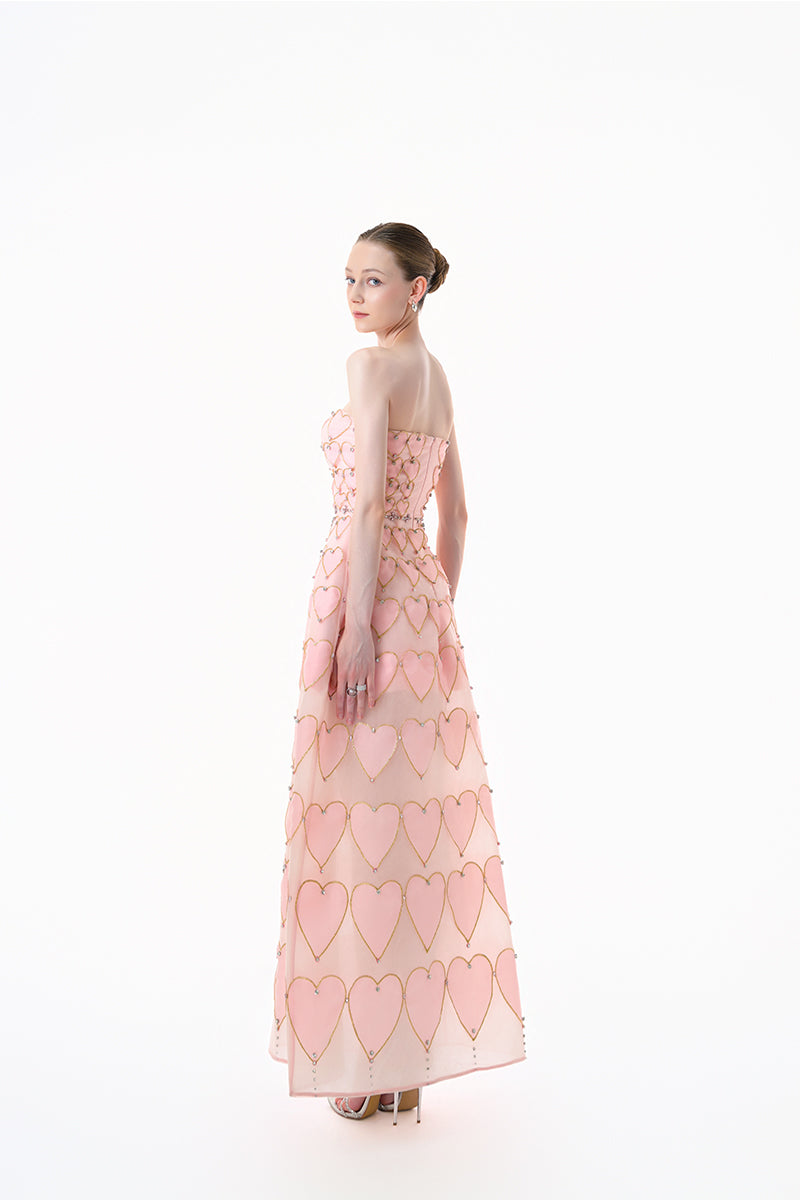 Blush pink embellished heart motif gown by Happy Clothing, featuring intricate details and elegant design.
