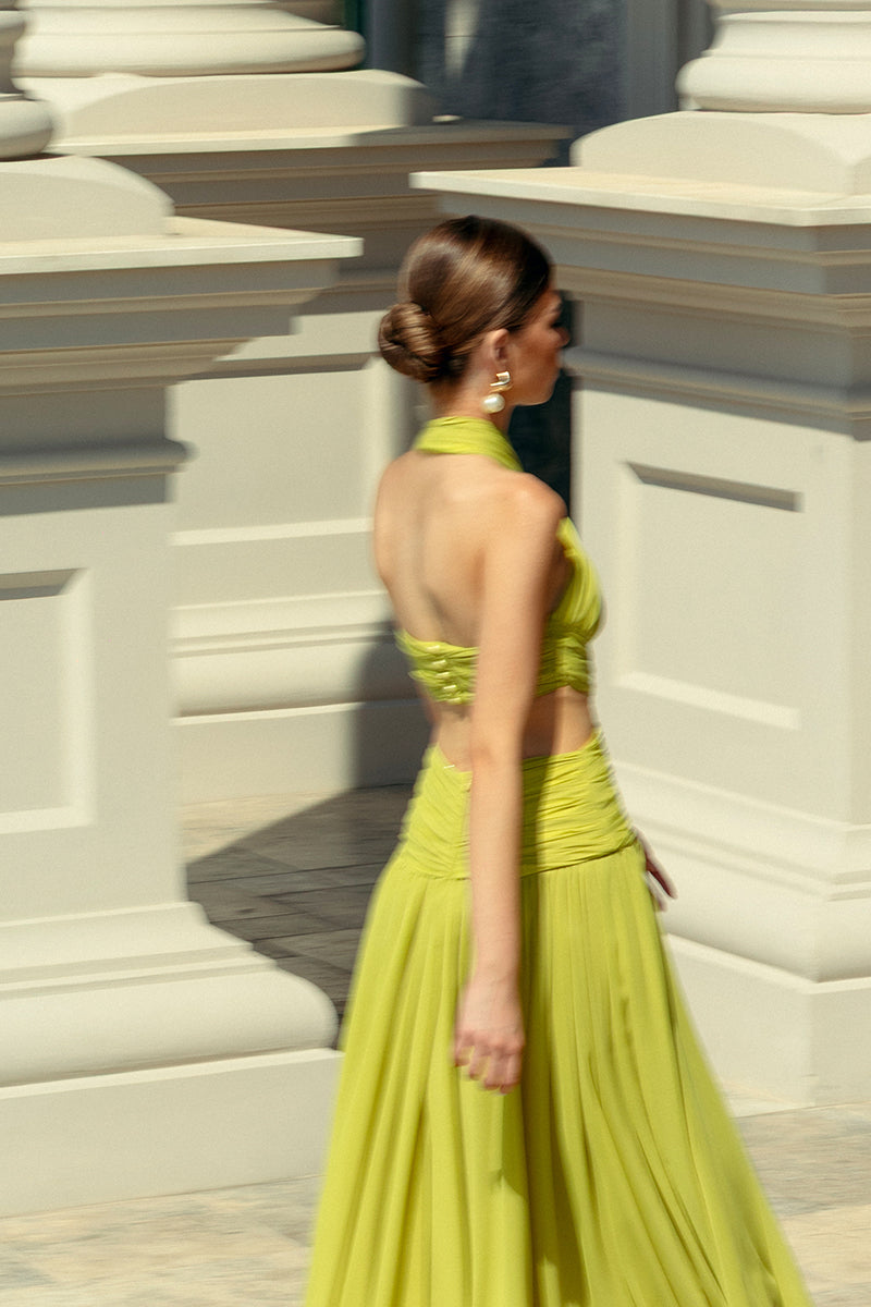 Monika Dimova lime draped chiffon maxi dress with flowing fabric and elegant silhouette, perfect for formal occasions.