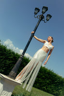 Ivory fringe two-piece co-ords set by Monika Dimova, featuring a stylish top and matching skirt with fringe details.