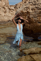 IKINITA LA BIANA IN BLUE mini dress displayed on a model, featuring a stylish and vibrant blue design perfect for casual or semi-formal wear.