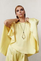 VIONA satin cape in lemon zest color, stylish jacket by Nazlı Ceren with smooth satin fabric and elegant drape.