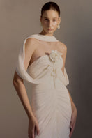 White Plan Sedley dress gown featuring a flowing design with long sleeves and elegant fabric for formal occasions.