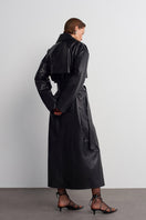 Black leather trench jacket by Acaria Studio, featuring classic design, tailored fit, and stylish lapels.