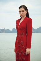 Lune De Soie velvet satin gown featuring a flowing silhouette and elegant design, displayed on a mannequin.