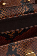 Vikele Studio Stephanie animal print top handle bag with structured design and leather strap, stylish accessory for everyday use.