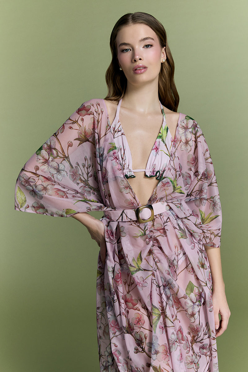 Nur Karaata Island Mirage cover up in lightweight fabric, featuring a relaxed fit and tropical print, perfect for beachwear.