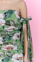 Nur Karaata Poppy Reverie mini dress with floral pattern, sleeveless design, and fitted silhouette on a model.