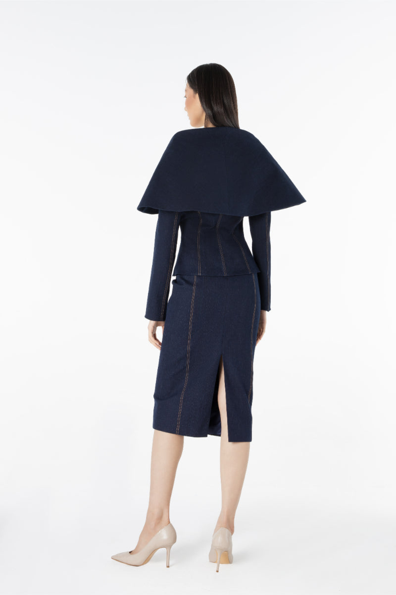 Lili Blanc Linea denim midi skirt with a high waist and classic denim wash, displayed on a neutral background.