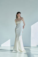 Ivory botanic embellished cupro gown by JINSUN featuring intricate floral details and elegant flowing fabric.