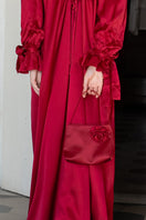 Red Tuscan Rose silk handbag with shoulder strap from Not Just Pajama, featuring elegant design and soft, luxurious fabric.