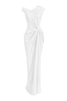 Le Thanh Hoa luminous pearl gown featuring a flowing silhouette, intricate beadwork, and elegant design for special occasions.