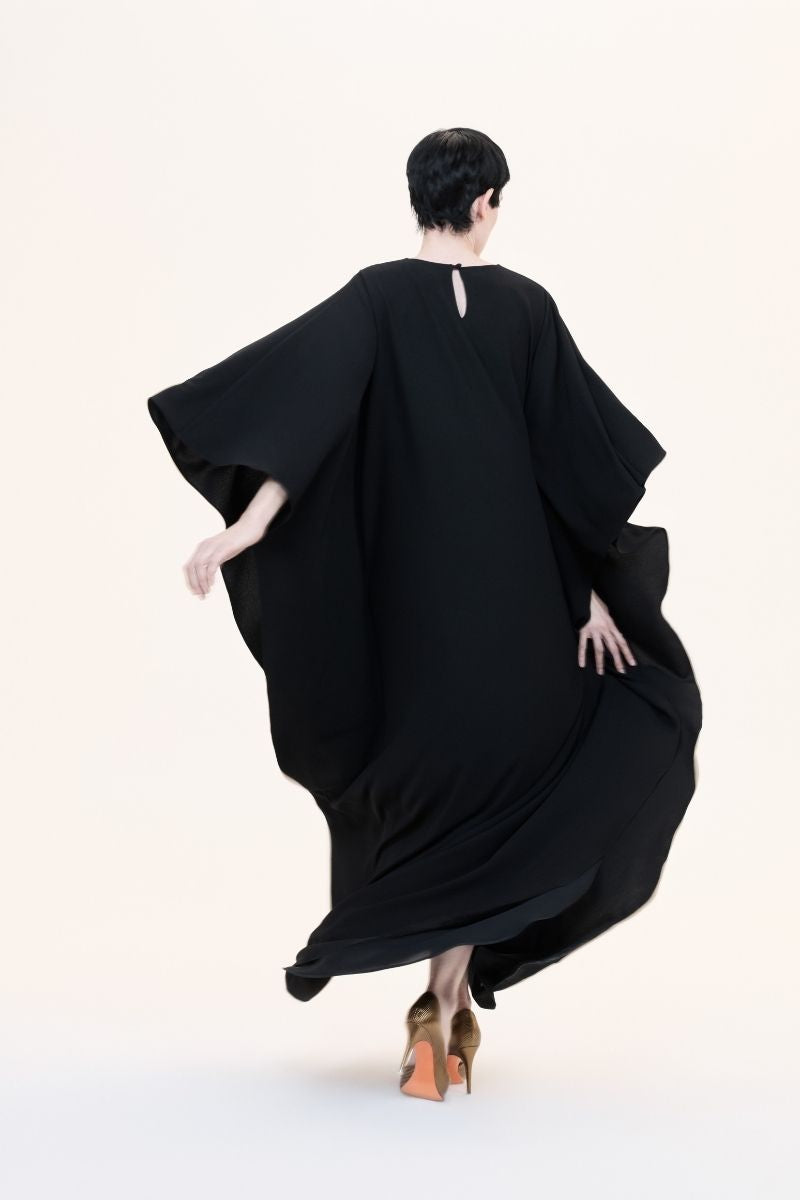 Nihan Peker NEEHAL Batwing Gown in elegant fabric with flowing batwing sleeves, ideal for formal occasions.